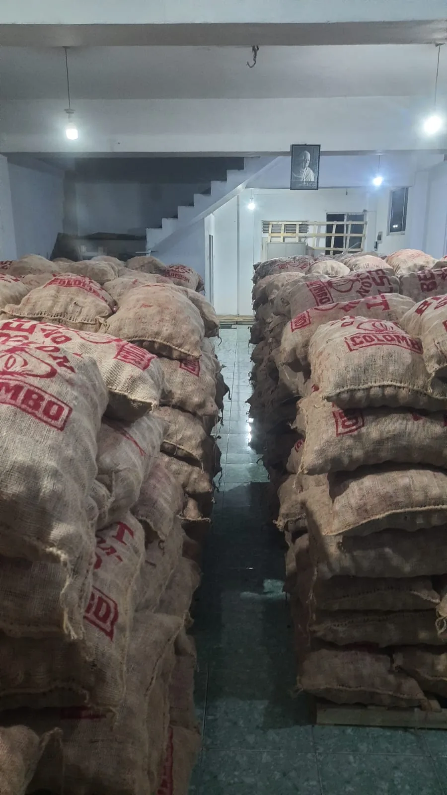Jute sacks stacked in an indoor room